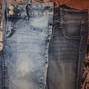 Two pairs of jeans.
